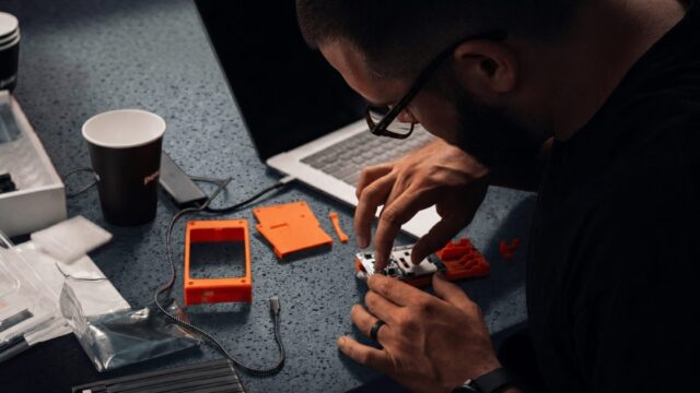 specter-shield-lite-orange-man-assembly-pcb-desk-closeup-photo-jpg